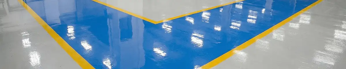 A factory floor professionally covered and marked with epoxy flooring in St Paul, MN