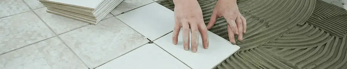 Professional installing white tile floors in St Paul, MN