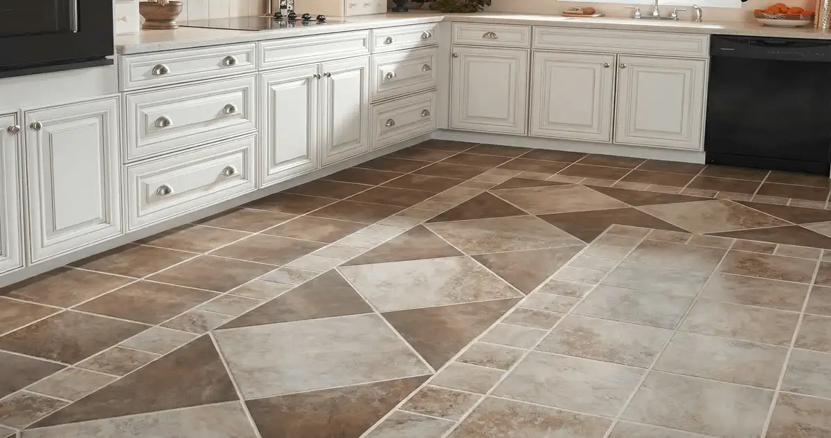 Kitchen with white cabinets and a professionally installed tile floor in St Paul, MN