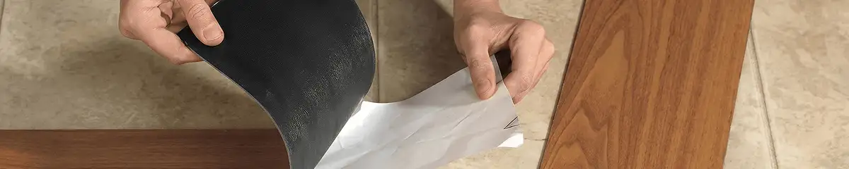 A professional installing vinyl flooring in St Paul, MN